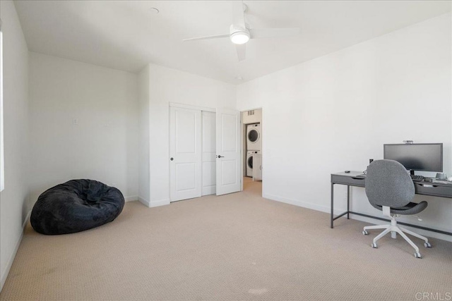 4366 Pacifica Way Unit 5, Oceanside, CA 92056 - office area with stacked washer / dryer, light colored carpet, and baseboards