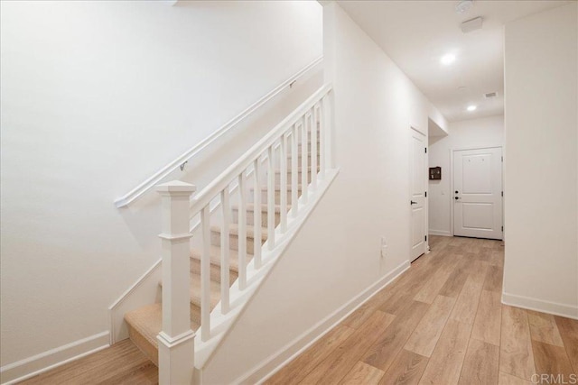 4366 Pacifica Way Unit 5, Oceanside, CA 92056 - stairway featuring wood finished floors, baseboards, and recessed lighting