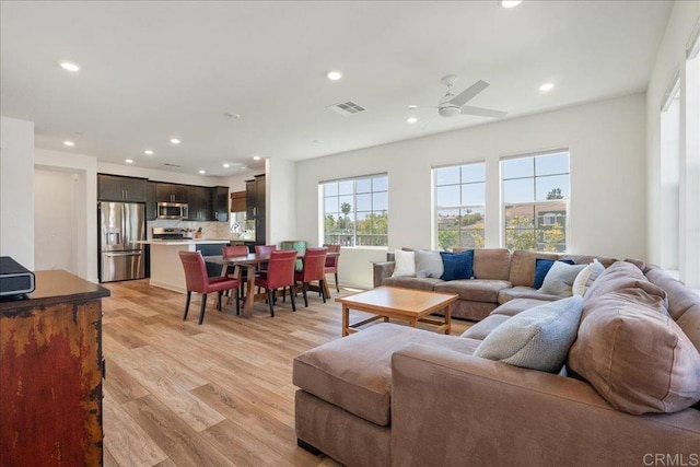 4366 Pacifica Way Unit 5, Oceanside, CA 92056 - living room featuring recessed lighting, light wood-style flooring, and a ceiling fan