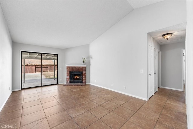 38115 41st St E, Palmdale, CA 93552 - unfurnished living room featuring tile patterned floors, baseboards, and a brick fireplace