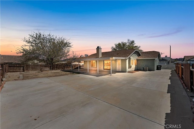 38115 41st St E, Palmdale, CA 93552 - ranch-style house with a fenced backyard, a chimney, and concrete driveway