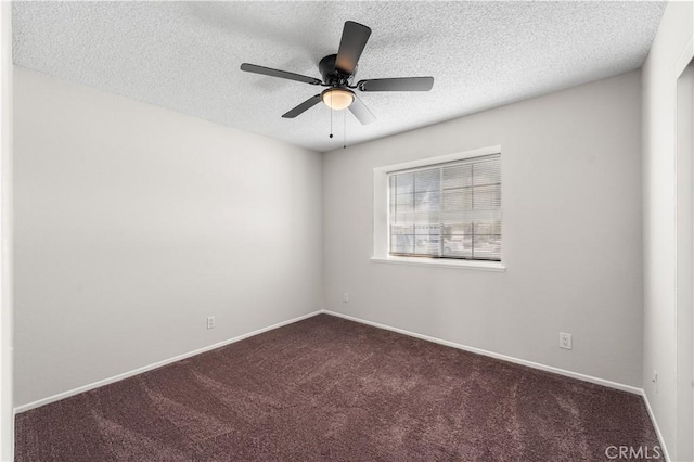 38115 41st St E, Palmdale, CA 93552 - empty room featuring dark colored carpet, a ceiling fan, a textured ceiling, and baseboards