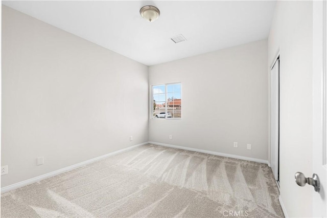 43453 Tali St, Lancaster, CA 93535 - unfurnished bedroom featuring carpet, baseboards, and a closet