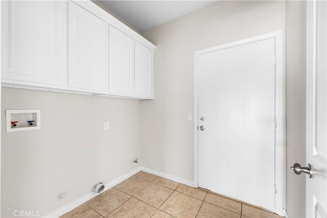 43453 Tali St, Lancaster, CA 93535 - laundry area featuring hookup for a washing machine, cabinet space, light tile patterned floors, gas dryer hookup, and baseboards