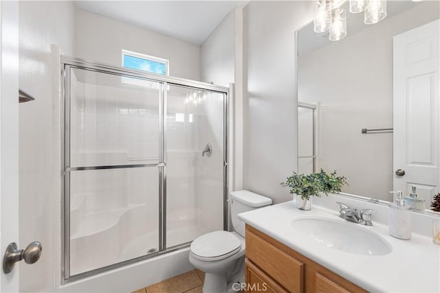 40729 Oakmont Ct, Palmdale, CA 93551 - full bath with a shower stall, toilet, vanity, and tile patterned floors