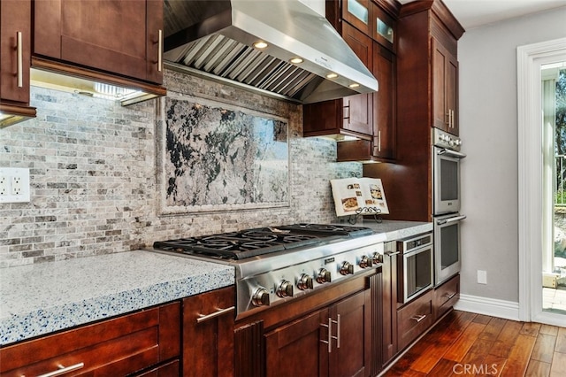 22581 Summerfield, Mission Viejo, CA 92692 - kitchen with wall chimney exhaust hood, appliances with stainless steel finishes, dark wood-style flooring, decorative backsplash, and recessed lighting
