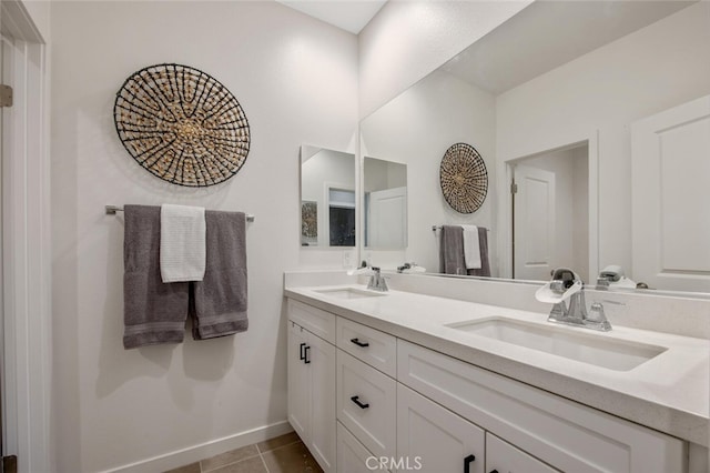 18171 Hedgerow Way, Saugus, CA 91350 - bathroom featuring double vanity and tile patterned floors