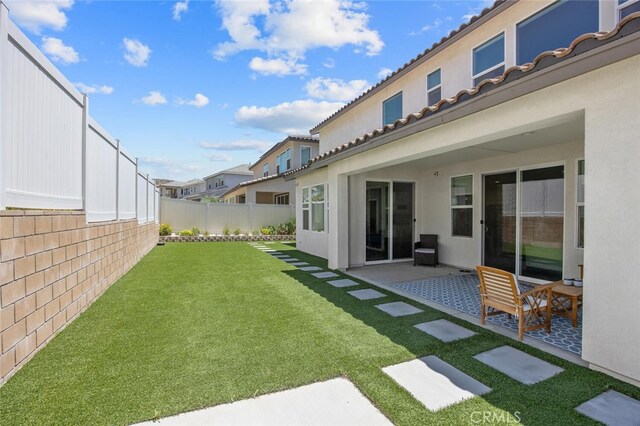 18171 Hedgerow Way, Saugus, CA 91350 - fenced backyard with a patio