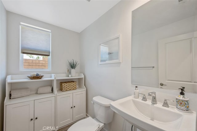 18171 Hedgerow Way, Saugus, CA 91350 - half bath with a sink and toilet