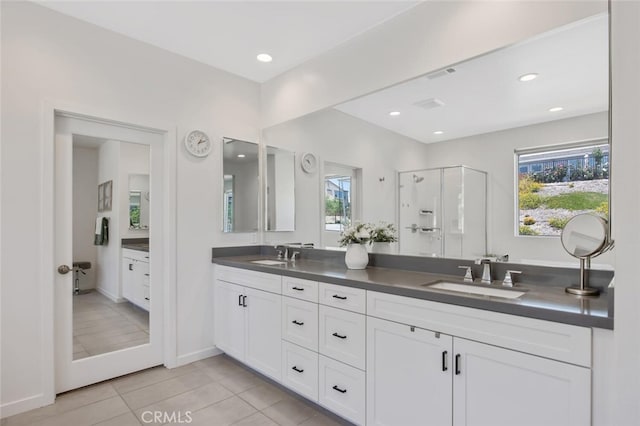 18171 Hedgerow Way, Saugus, CA 91350 - bathroom with double vanity, tile patterned flooring, a shower stall, plenty of natural light, and recessed lighting
