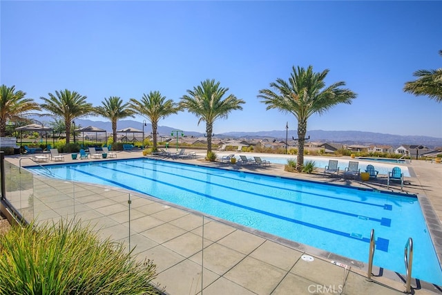18171 Hedgerow Way, Saugus, CA 91350 - community pool featuring a mountain view and a patio