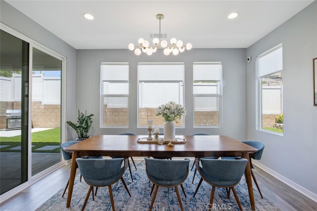 18171 Hedgerow Way, Saugus, CA 91350 - dining space featuring wood finished floors, a chandelier, and recessed lighting