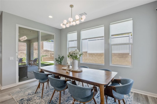 18171 Hedgerow Way, Saugus, CA 91350 - dining room featuring wood finished floors and recessed lighting