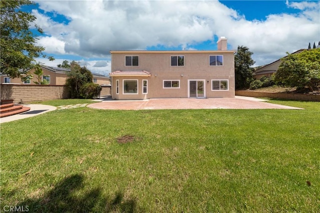 621 Foxhaven Pl, Diamond Bar, CA 91765 - back of house featuring a patio, stucco siding, and a chimney