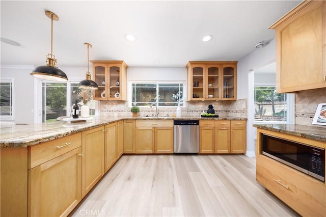 621 Foxhaven Pl, Diamond Bar, CA 91765 - kitchen featuring dishwasher, a sink, a peninsula, light wood-style floors, and tasteful backsplash