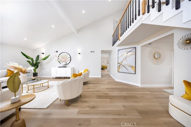621 Foxhaven Pl, Diamond Bar, CA 91765 - living area featuring baseboards, beamed ceiling, light wood-style flooring, high vaulted ceiling, and stairway