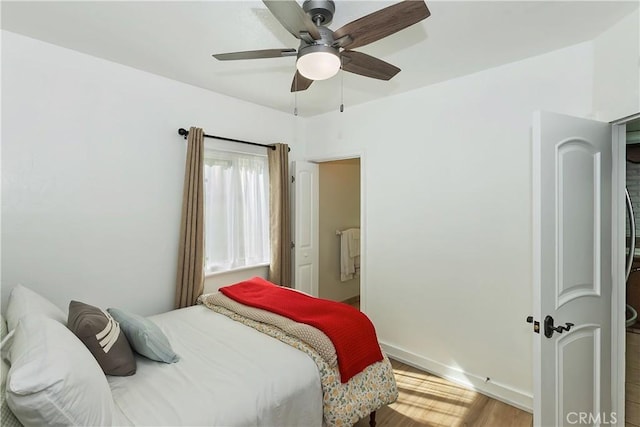 22771 Fir Ln, Crestline, CA 92325 - bedroom featuring wood finished floors, baseboards, and a ceiling fan