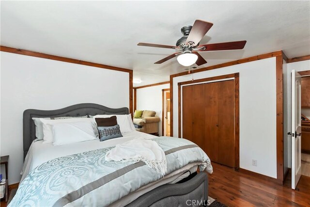 22771 Fir Ln, Crestline, CA 92325 - bedroom featuring wood finished floors, baseboards, and ceiling fan