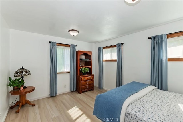 22771 Fir Ln, Crestline, CA 92325 - bedroom with light wood-style flooring and baseboards