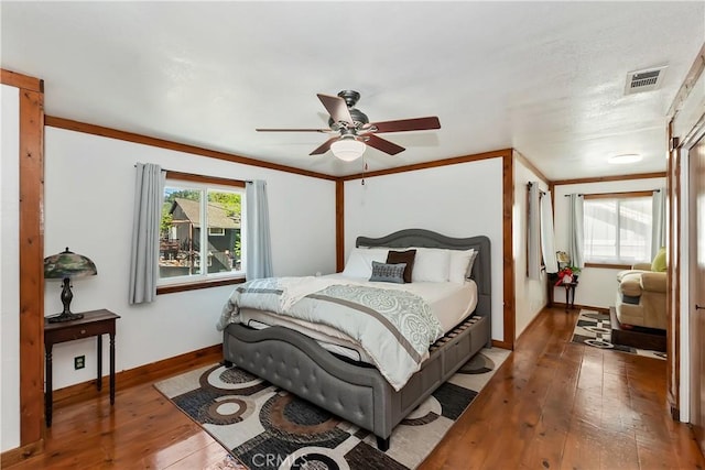 22771 Fir Ln, Crestline, CA 92325 - bedroom with hardwood / wood-style flooring, baseboards, and ceiling fan