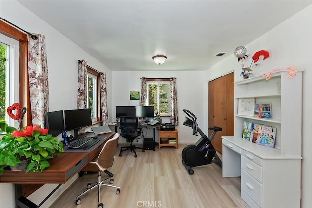 22771 Fir Ln, Crestline, CA 92325 - office area featuring plenty of natural light and light wood-style flooring