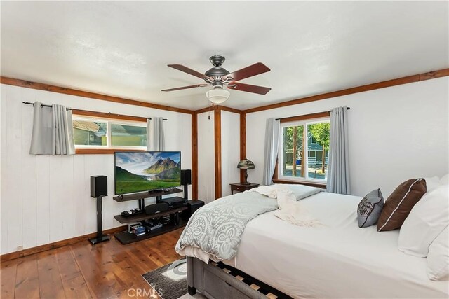 22771 Fir Ln, Crestline, CA 92325 - bedroom with hardwood / wood-style flooring, baseboards, and a ceiling fan