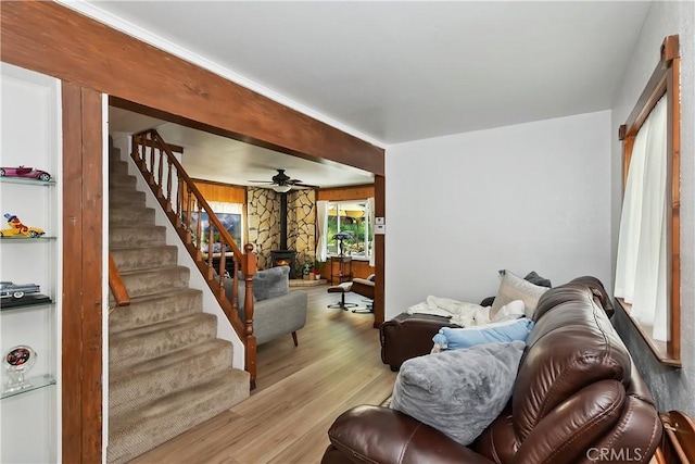 22771 Fir Ln, Crestline, CA 92325 - living room featuring wood finished floors, stairs, and a ceiling fan