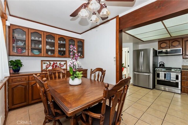 22771 Fir Ln, Crestline, CA 92325 - dining room with light tile patterned flooring and ceiling fan