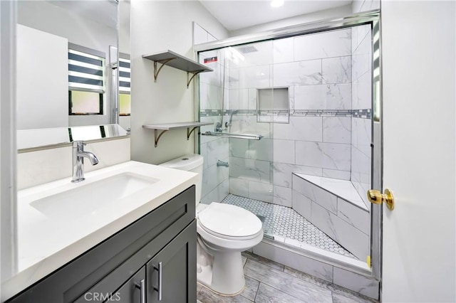 7035 Jon Allan Dr, North Hollywood, CA 91605 - full bathroom featuring toilet, a shower stall, vanity, and recessed lighting