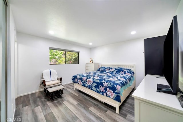 7035 Jon Allan Dr, North Hollywood, CA 91605 - bedroom with wood finished floors and recessed lighting