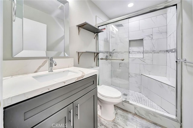7035 Jon Allan Dr, North Hollywood, CA 91605 - full bathroom featuring a shower stall, toilet, and vanity