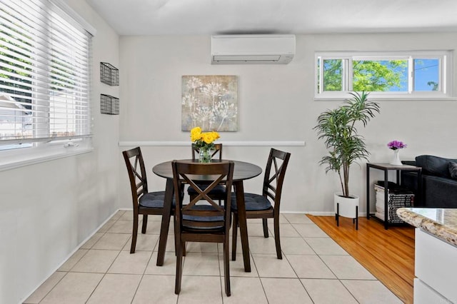 1529 Moreno St, Oceanside, CA 92054 - dining room with a wall mounted AC and light tile patterned floors
