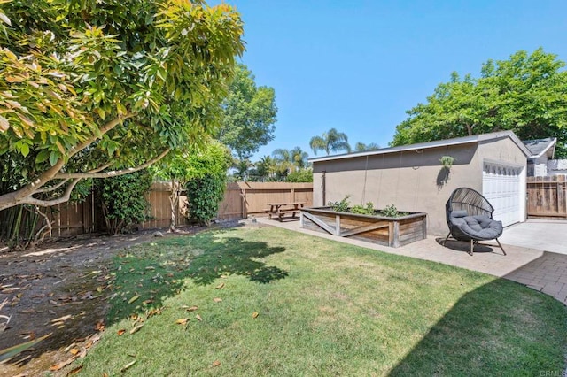 1529 Moreno St, Oceanside, CA 92054 - view of yard with a detached garage and a vegetable garden