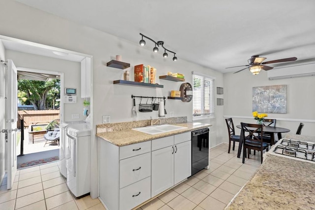 1529 Moreno St, Oceanside, CA 92054 - kitchen featuring a sink, black dishwasher, open shelves, and light tile patterned floors