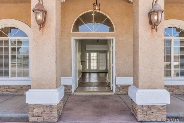 17322 Danbury Ave, Hesperia, CA 92345 - view of exterior entry featuring stucco siding and stone siding