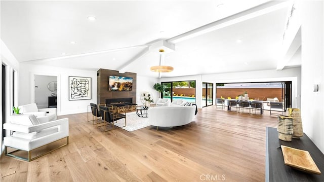 18823 La Amistad Pl, Tarzana, CA 91356 - living room with a fireplace and wood finished floors