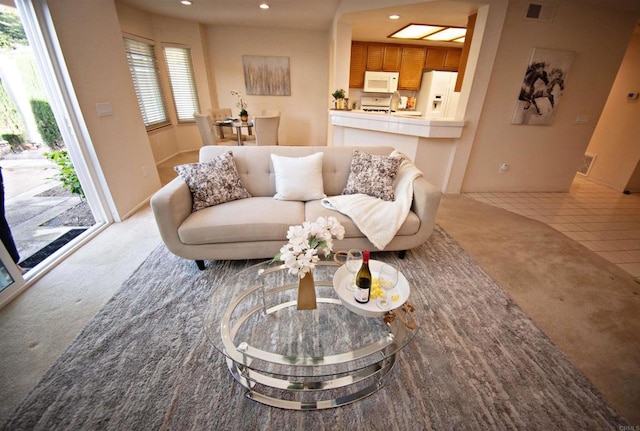 10908 Avenida Playa Veracruz, San Diego, CA 92124 - living area with light colored carpet and recessed lighting