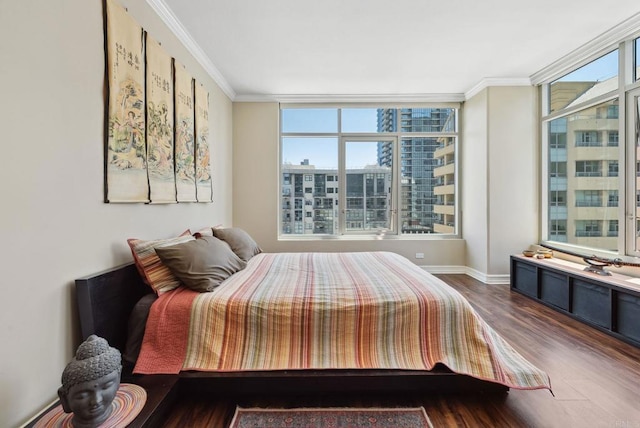 425 W Beech St Unit 1251, San Diego, CA 92101 - bedroom featuring multiple windows, wood finished floors, ornamental molding, and baseboards