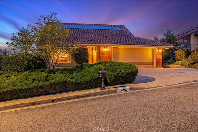 28367 Mount Stephen Ave, Canyon Country, CA 91387 - view of front of property featuring driveway, a garage, and a tiled roof