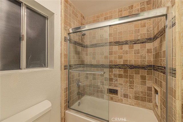 28367 Mount Stephen Ave, Canyon Country, CA 91387 - bathroom featuring toilet and shower / bath combination with glass door
