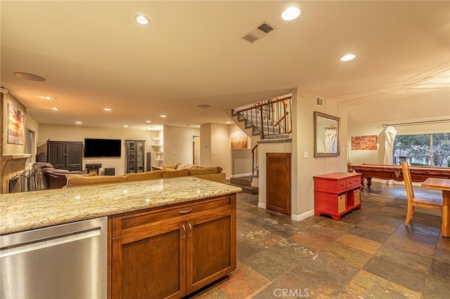28367 Mount Stephen Ave, Canyon Country, CA 91387 - kitchen with dishwasher, open floor plan, stone tile floors, recessed lighting, and light stone counters