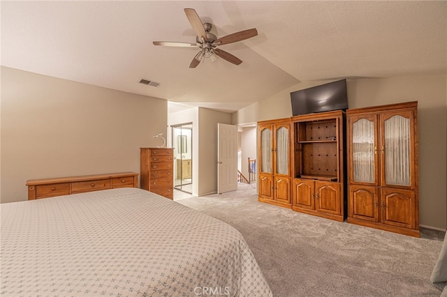 28367 Mount Stephen Ave, Canyon Country, CA 91387 - bedroom with light colored carpet, vaulted ceiling, ensuite bathroom, and a ceiling fan