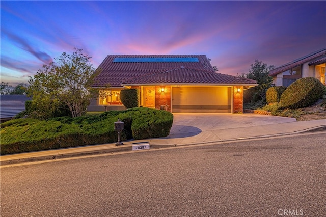 28367 Mount Stephen Ave, Canyon Country, CA 91387 - view of front facade featuring a tiled roof, an attached garage, and driveway