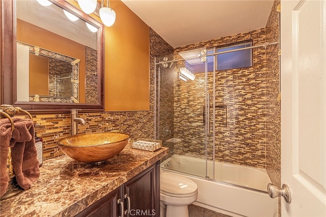 28367 Mount Stephen Ave, Canyon Country, CA 91387 - full bathroom with vanity, enclosed tub / shower combo, and decorative backsplash