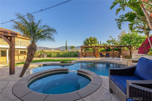 28367 Mount Stephen Ave, Canyon Country, CA 91387 - view of pool with a mountain view, a patio area, a pergola, and a pool with connected hot tub