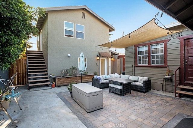 3031 4th Ave, Los Angeles, CA 90018 - view of patio featuring stairs and an outdoor living space
