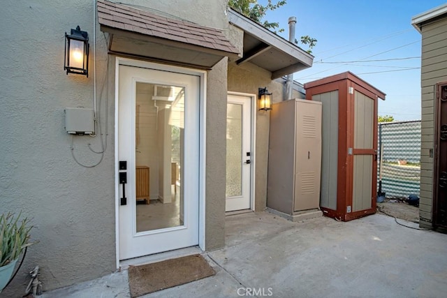 3031 4th Ave, Los Angeles, CA 90018 - doorway to property with stucco siding and roof with shingles