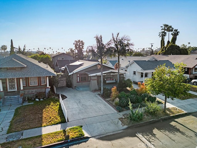 3031 4th Ave, Los Angeles, CA 90018 - view of front of property featuring concrete driveway and a residential view