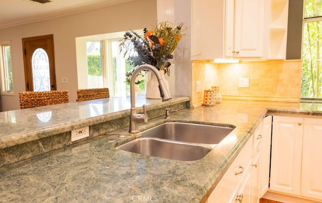 14816 Covello St, Van Nuys, CA 91405 - kitchen featuring a sink, light stone countertops, decorative backsplash, open shelves, and white cabinetry