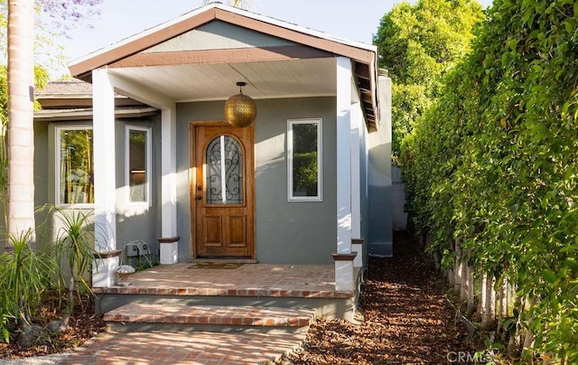 14816 Covello St, Van Nuys, CA 91405 - entrance to property with stucco siding and covered porch